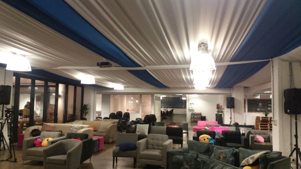 Corporate function setup at GetSmarter in Cape Town, featuring refined draping by The Events Draping Co.