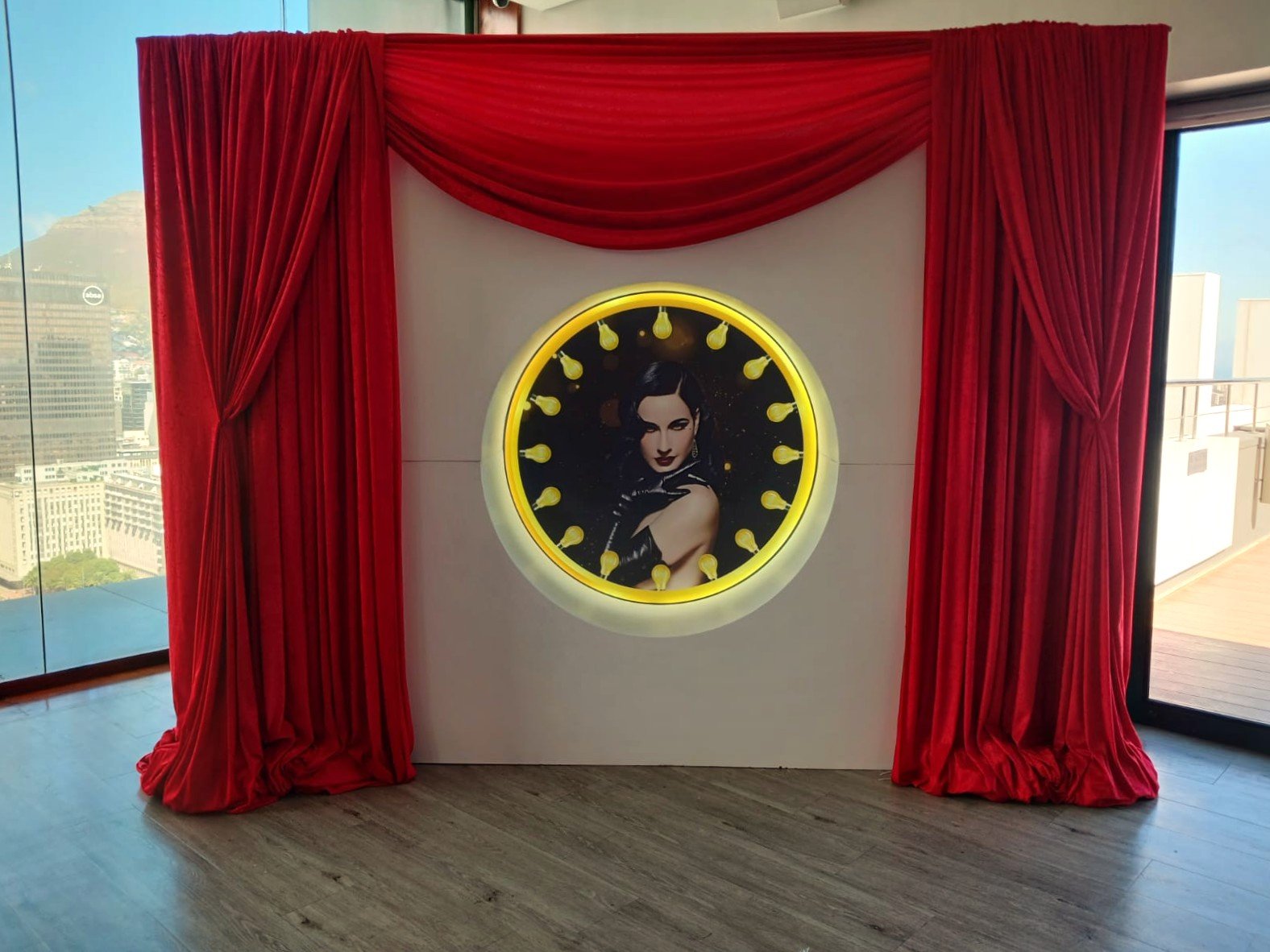 - Red velour draped feature frame for photo-op