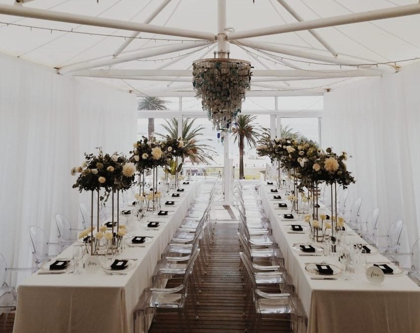 Wedding setup at The Bay Hotel, Camps Bay, Cape Town, featuring elegant draping by The Events Draping Co.