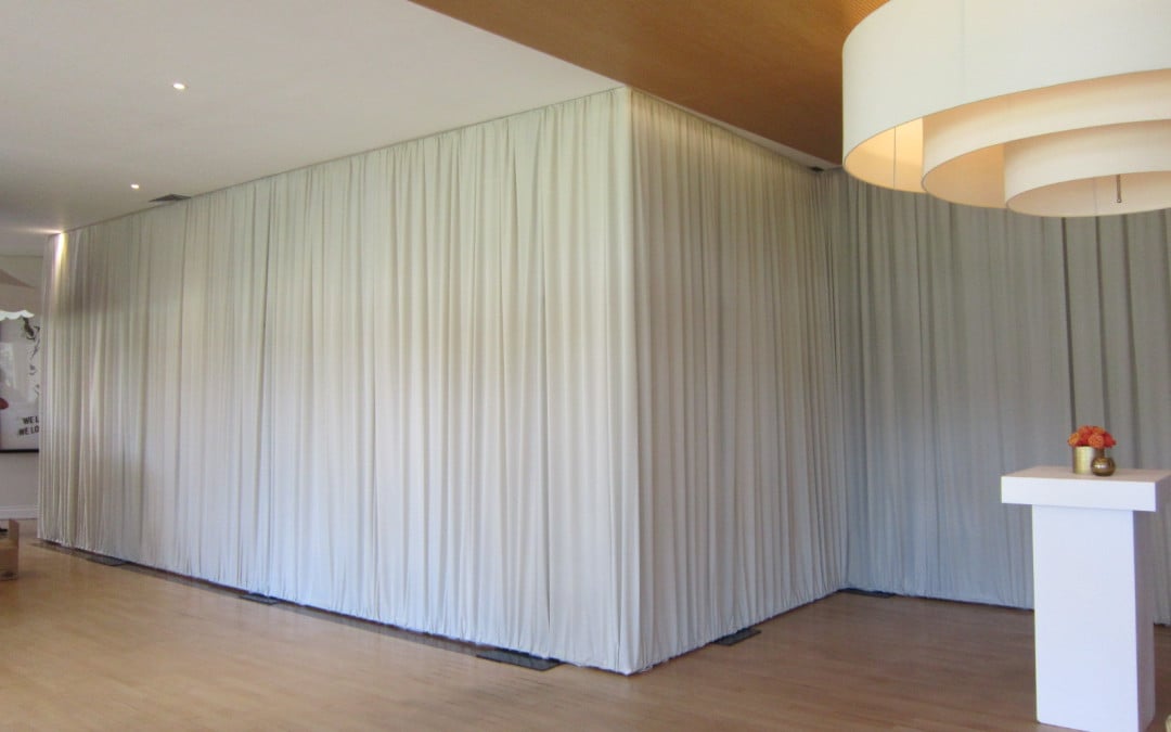 60th birthday celebration at Mount Nelson Hotel, Cape Town, featuring soft stone-colored fabric draping by The Events Draping Co. in the Oasis Bistro.