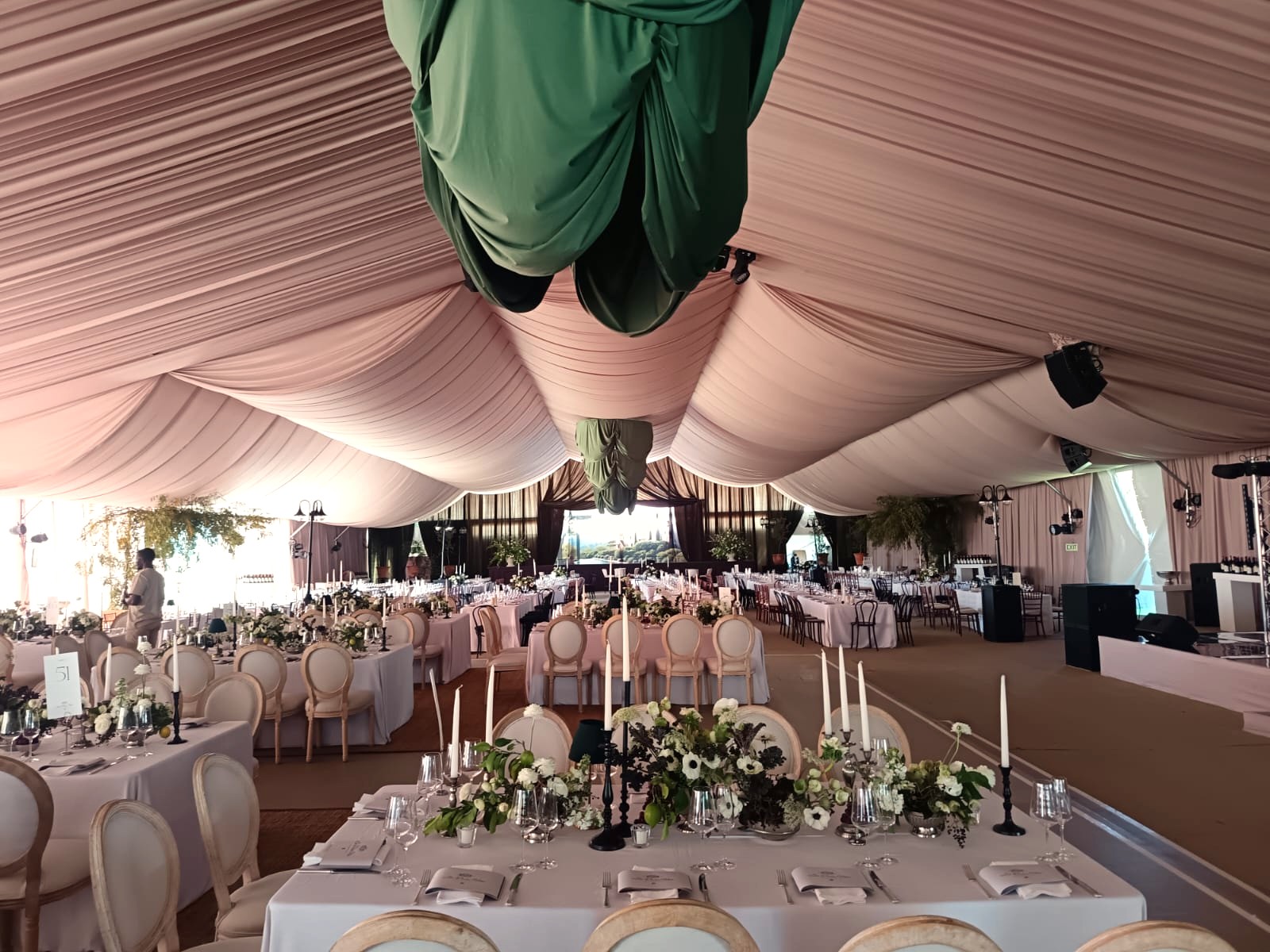 Wall draping in off-white with overdrapes