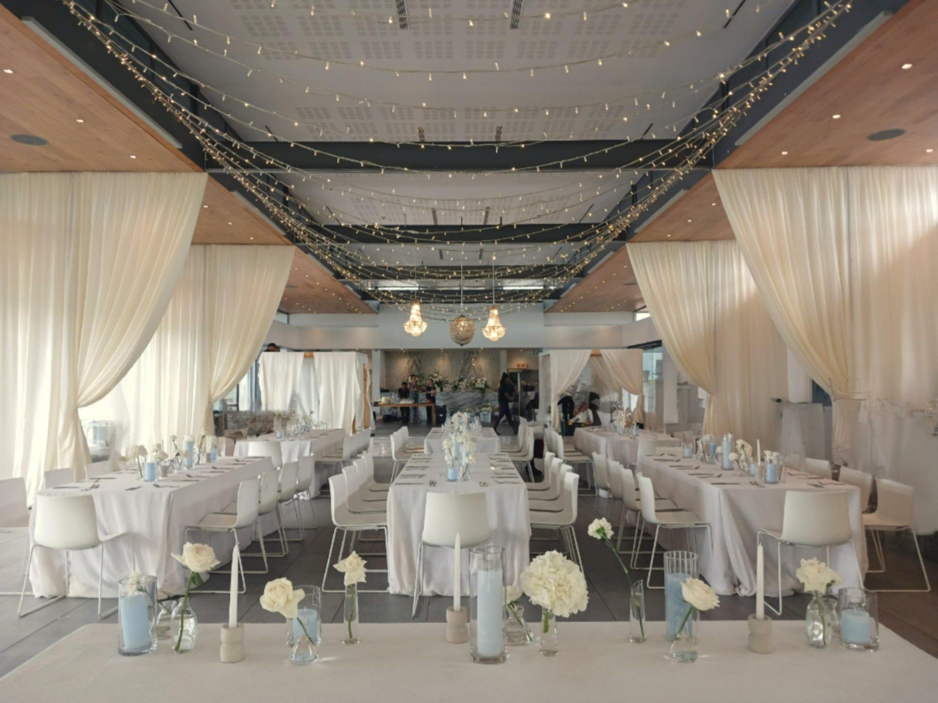 Side draping swags in off-white by The Events Draping Co.