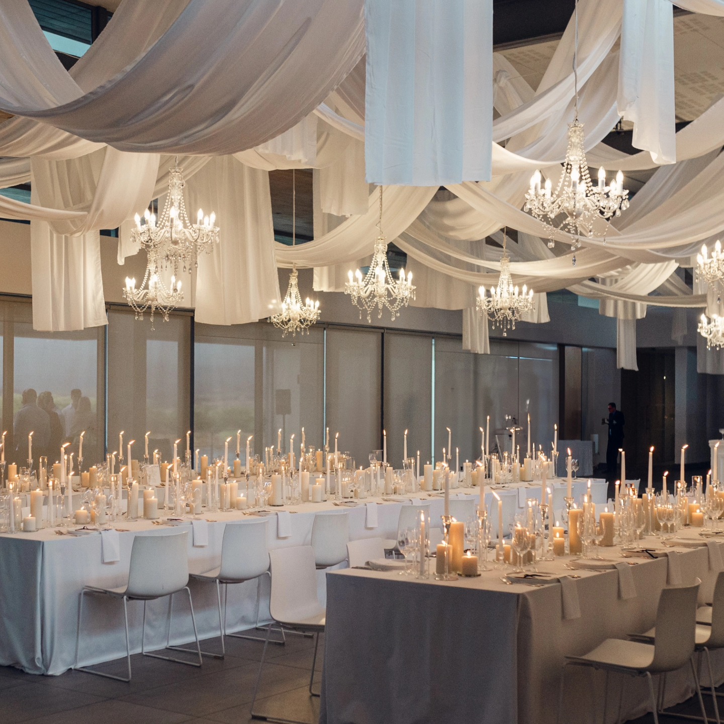 - Random ceiling swags and drops in white fabric