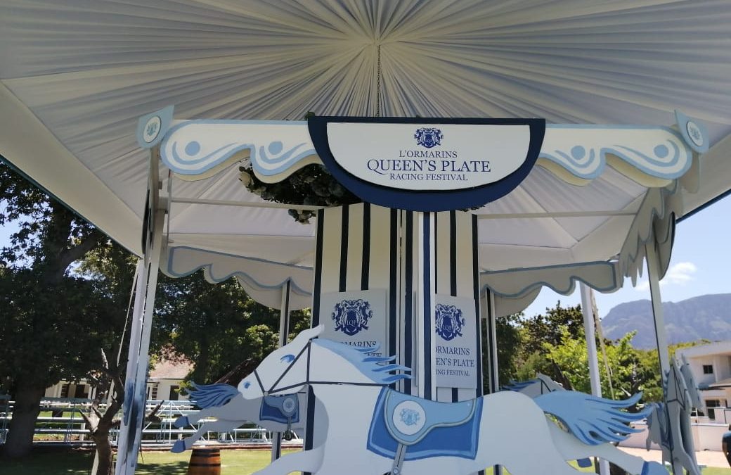 Setup for the L'Ormarins Queen's Plate at Kenilworth Racecourse, Cape Town, featuring elegant draping by The Events Draping Co.
