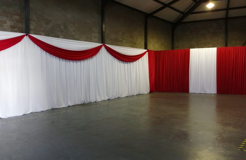 Corporate function setup in Strand, Cape Town, featuring elegant draping by The Events Draping Co.