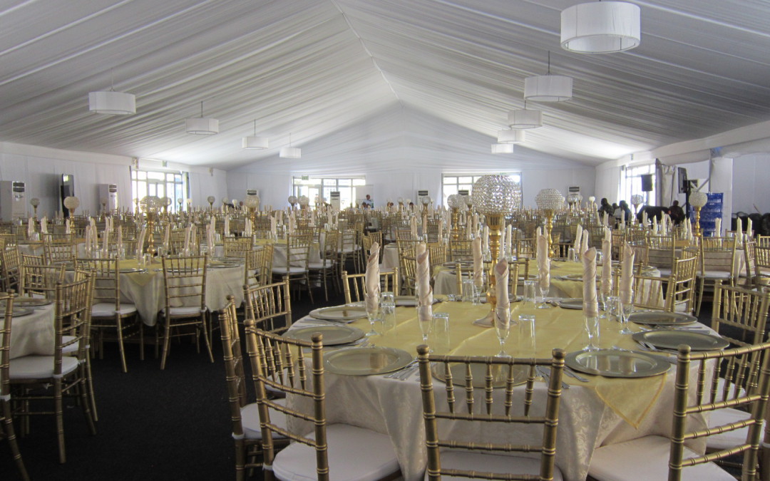 Commemoration ceremony at the Castle of Good Hope, Cape Town, featuring white fabric draping from roof to floor by The Events Draping Co.