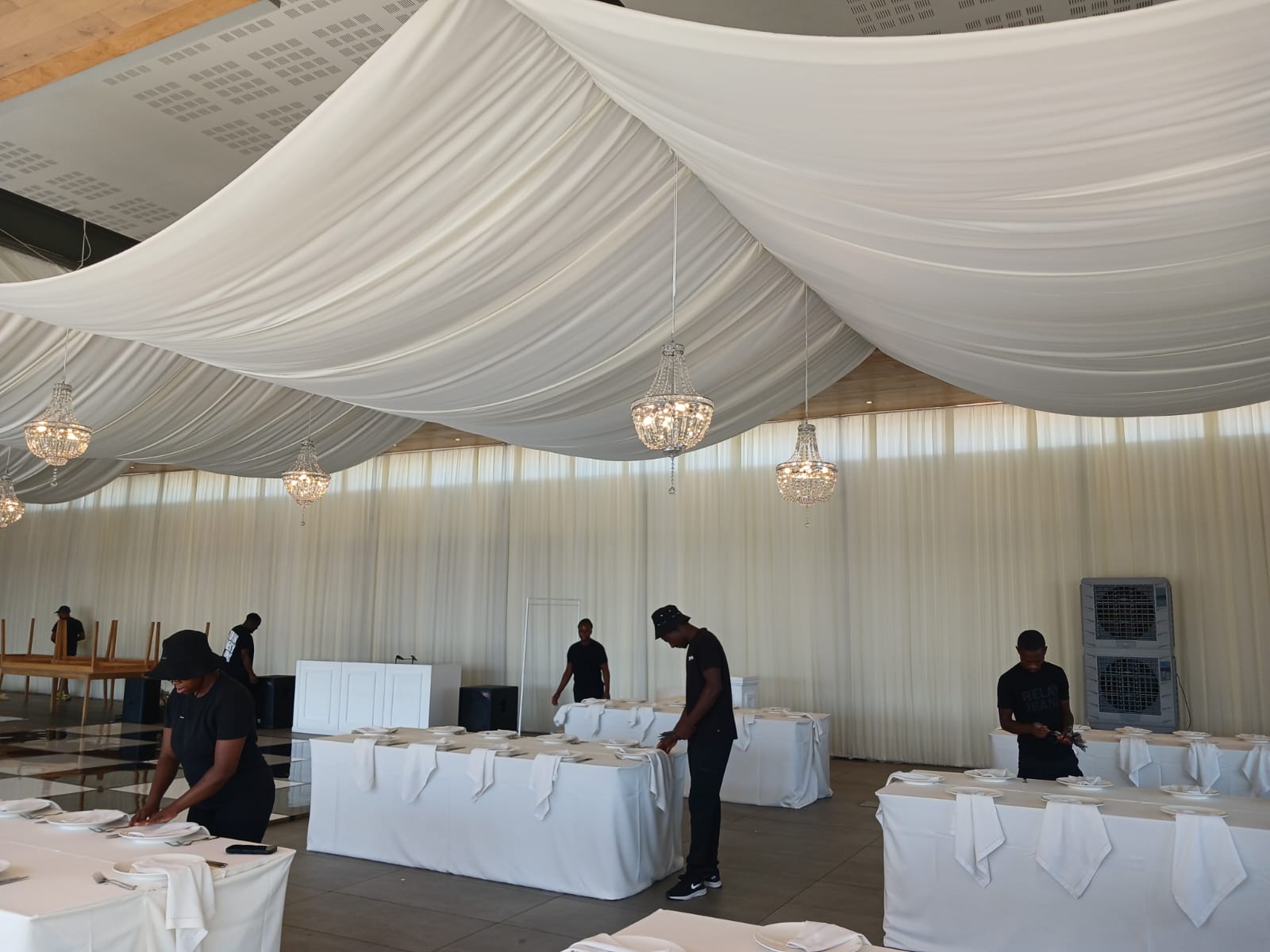  Full ceiling swags and wall draping in white by The Events Draping Co.
