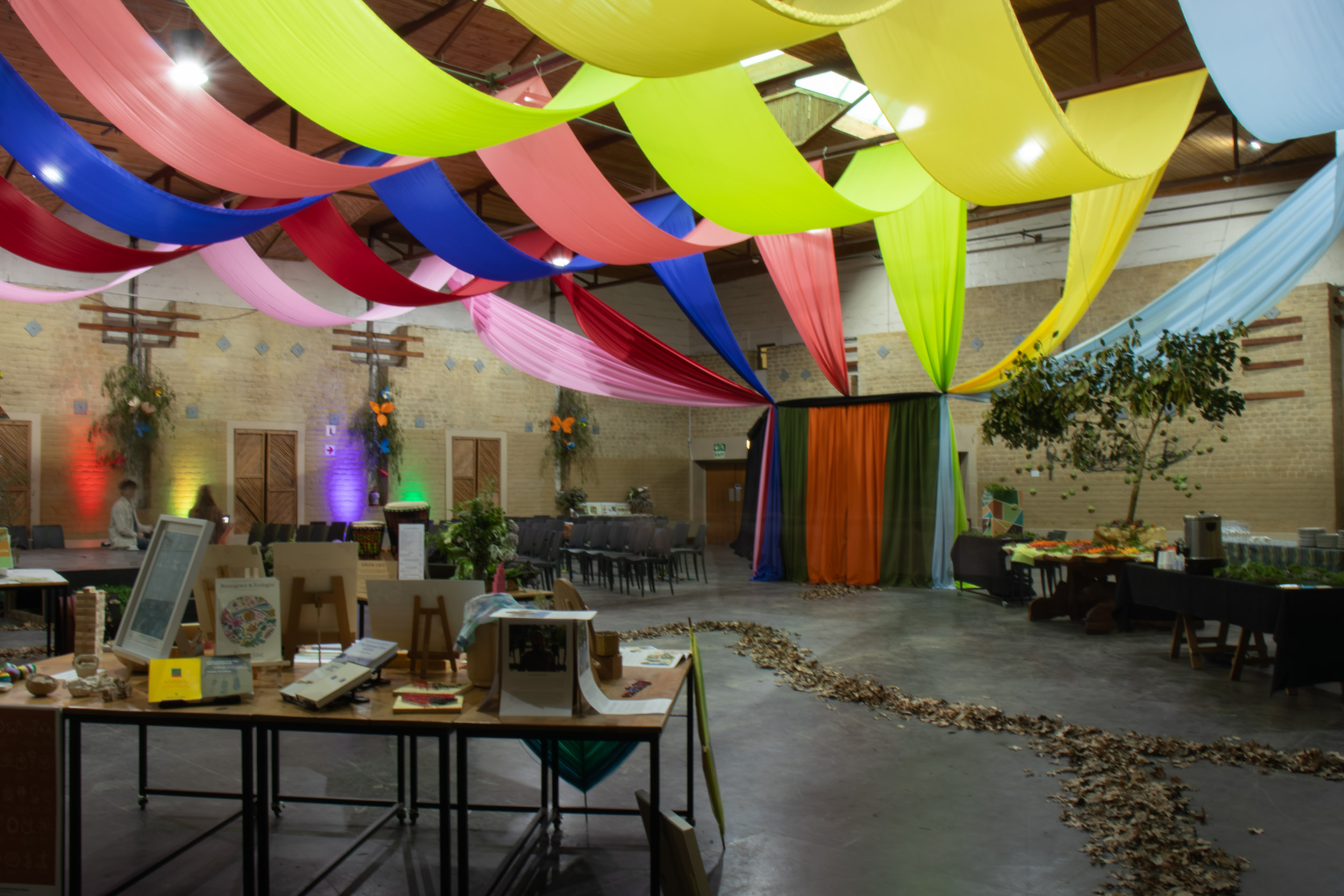 Dramatic multi- coloured ceiling swags by The Events Draping Co.