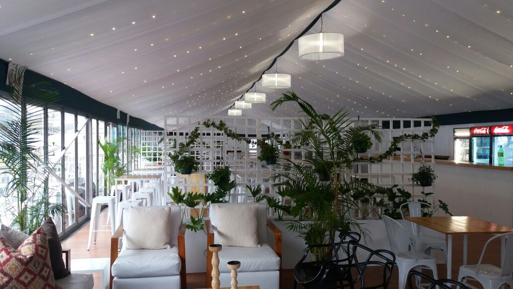 Marquee setup for the 2018 Two Oceans Marathon in Cape Town, featuring professional draping by The Events Draping Co.